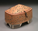 Thrown, altered box. Beige glaze with metal hinges and latch.