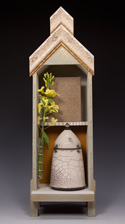 18" x 6" x 6" with Raku, metal,<br />paint, glass, handmade book