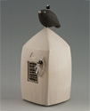 Thrown, altered box. Beige glaze with metal hinges and latch.